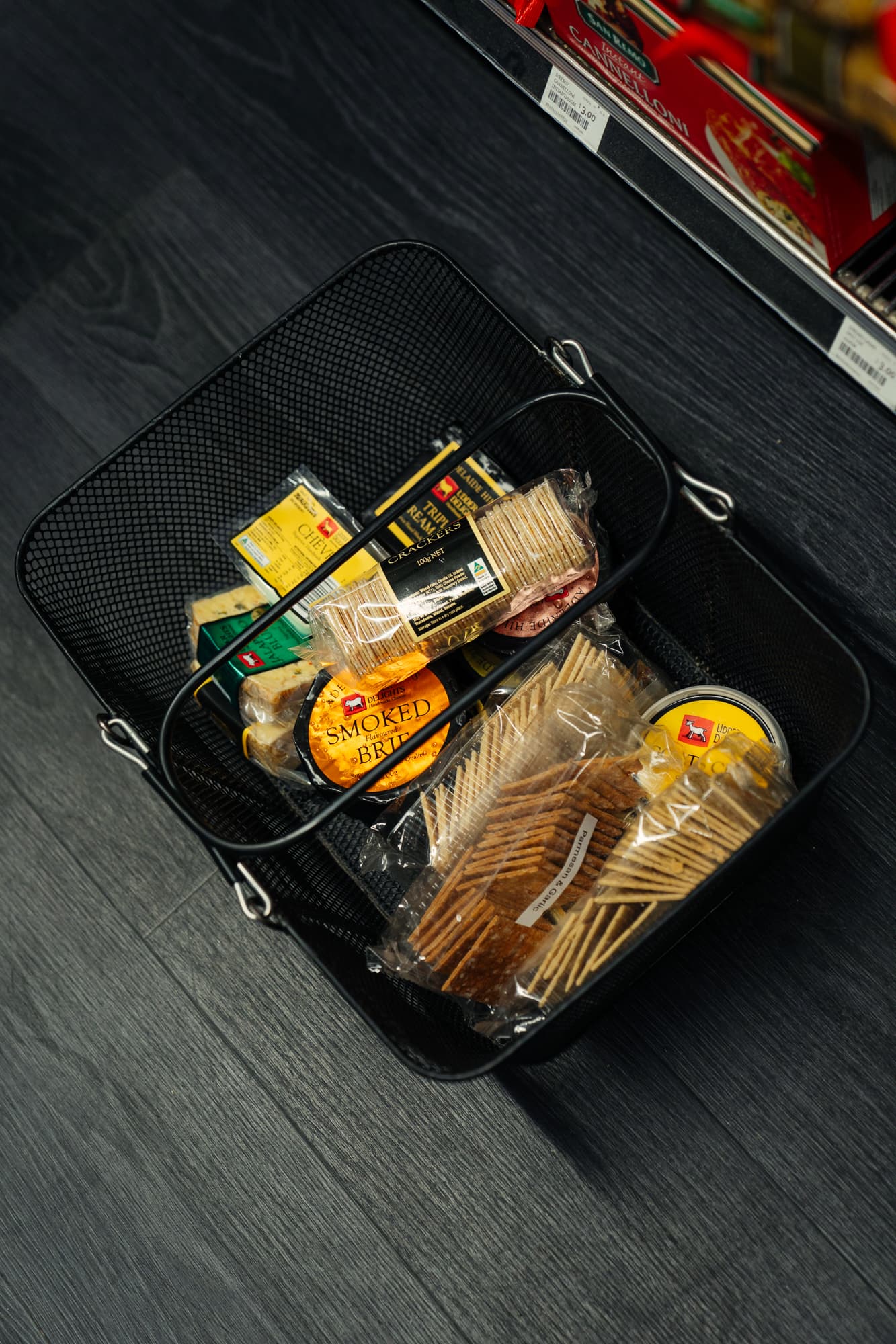 Supermarket basket full of premium food products